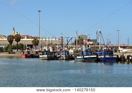 LUDERITZ NAMIBIA - JAN 26 2016: The port of Luderitz Luderitz is a harbour town in southwest Namibia lying on one of the least hospitable coasts in Africa