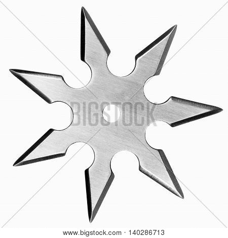 Silver colored metal shuriken isolated on white background.