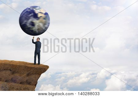 global environmental business concept businessman spinning earth on one finger