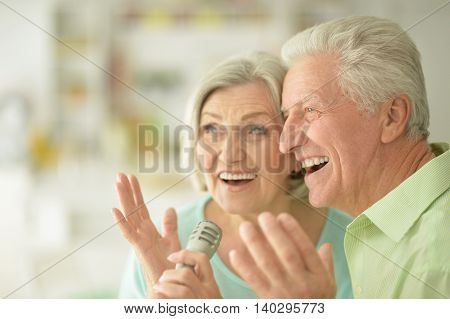 Portrait of a Senior couple and microphone