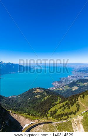 Aerial view of Lake Geneva and Montreux city from the view platform on Rochers-de-Naye on a sunny summer day in canton of Vaud Switzerland.