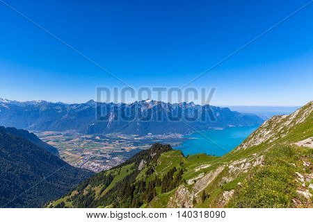 Aerial view of Lake Geneva and Montreux city from the view platform on Rochers-de-Naye on a sunny summer day in canton of Vaud Switzerland.