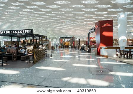 SHENZHEN, CHINA - CIRCA MAY, 2016: Starbucks at Shenzhen Bao'an International Airport. Starbucks Corporation is an American coffee company and coffeehouse chain.