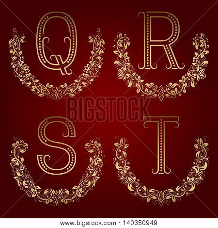 Q R S T vintage monograms in floral wreaths. Set of golden letters in laurels.