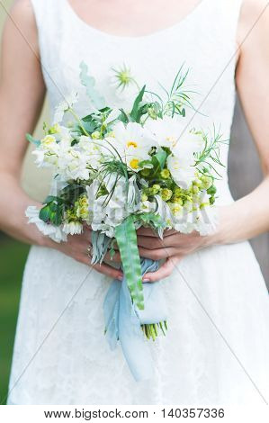 Very beautiful  bride's bouquet in the hands