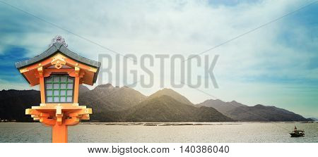 Japanese Buddhism lantern with island background for Japan travel banner. Japanese travel advertisement banner for website and travel blog.