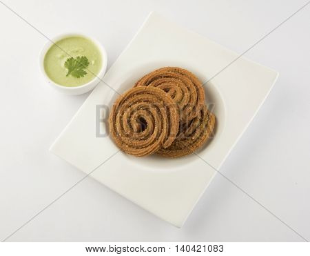traditional indian snack chakli, chakali or murukku