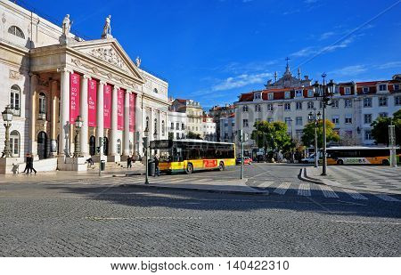 LISBON PORTUGAL - DECEMBER 21: National theatre building on the square of Dom Pedro IV on december 21 2013. Lisbon is a capital and the largest city of Portugal.