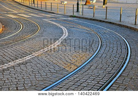 The winding road with the tram lines