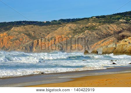 Ocean waves and sand beach Guincho Portugal