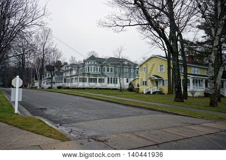 WEQUETONSING, MICHIGAN / UNITED STATES - DECEMBER 22, 2015: Large homes on Second Avenue in Wequetonsing, Michigan.