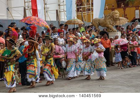 Leon Nicaragua - December 12 2015: Aborigen dancers in typical dress celebrating on the street