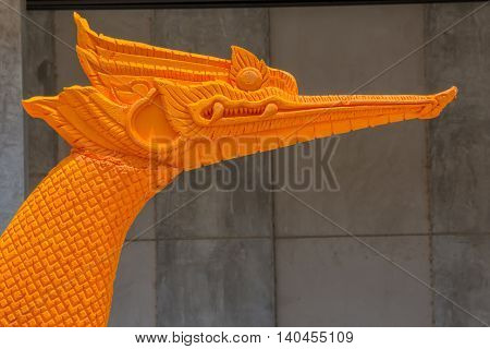 Swan head big orange to festival candle.