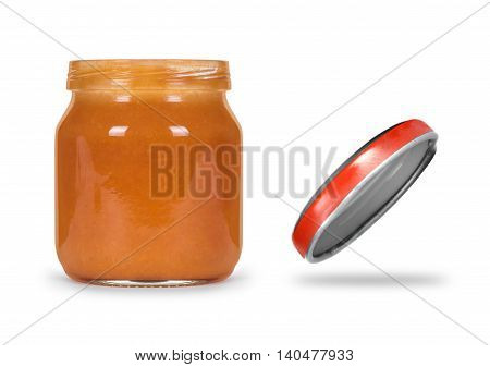 Open jar of jam or baby food on a white background