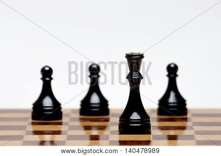 Chess pieces on the Board on a white background