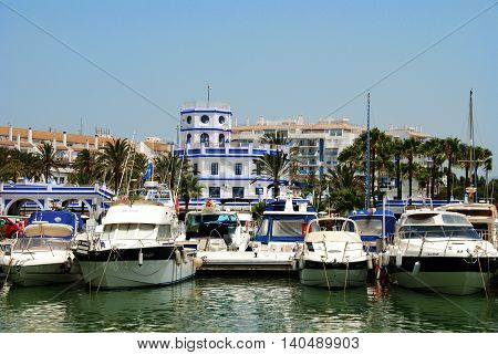 ESTEPONA, SPAIN - JULY 18, 2008 - View of boats and yachts in the marina with the harbour masters office to the rear Estepona Malaga Province Andalusia Spain Western Europe, July 18, 2008.