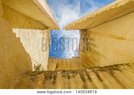 Lithica Pedreres des Hostal old quarry sandstone high walls at Menorca island, Balearic islands, Spain.