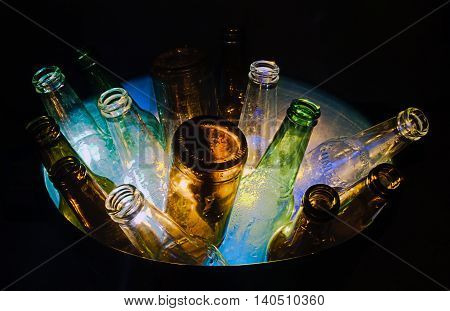 Bunch of glass bottles ready to be recycled
