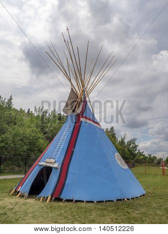 CALGARY, CANADA - JULY 9: View of Tipis in the Indian Village at the Calgary Stampede on July 9, 2016 in Calgary, Alberta. The Indian Village represents First Nations people at the Calgary Stampede.