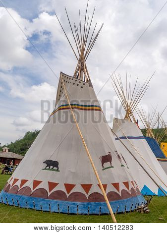 CALGARY, CANADA - JULY 9: View of Tipis in the Indian Village at the Calgary Stampede on July 9, 2016 in Calgary, Alberta. The Indian Village represents First Nations people at the Calgary Stampede.