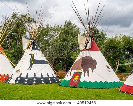CALGARY, CANADA - JULY 9: View of Tipis in the Indian Village at the Calgary Stampede on July 9, 2016 in Calgary, Alberta. The Indian Village represents First Nations people at the Calgary Stampede.