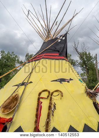 CALGARY, CANADA - JULY 9: View of Tipis in the Indian Village at the Calgary Stampede on July 9, 2016 in Calgary, Alberta. The Indian Village represents First Nations people at the Calgary Stampede.