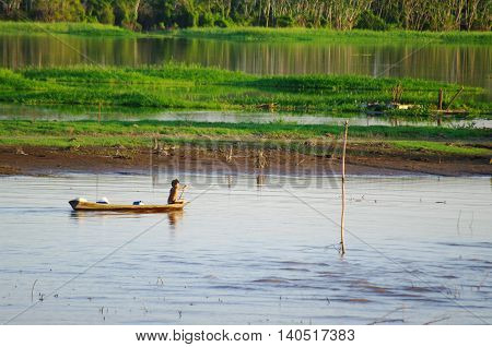 Manaus, Br, Circa August 2011 - Boy On A Canoe On The Amazon River, Circa August 2012 At Manaus, Br.