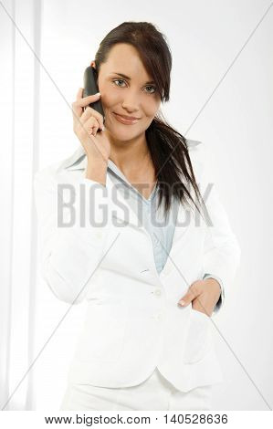 Woman talking on the phone. Business concept
