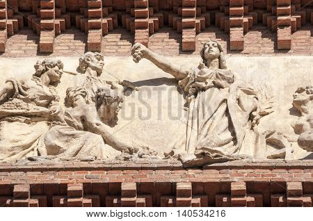 fragment of famous Arc de Triomf frieze in Barcelona Spain