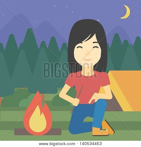 An asian woman kindling campfire on the background of camping site with tent. Tourist relaxing near campfire. Woman sitting near campfire. Vector flat design illustration. Square layout.