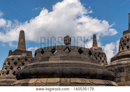 Borobudur Temple in Indonesia, clear day cloudy blue sky