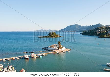 Panorama of Chalikiopoulou Lagoon and Pontikonisi and Vlacheraina monastery on the island of Corfu Greece.
