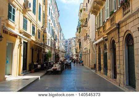 CORFU-AUGUST 22: Venetian architecture in Kerkyra city with the row of local restaurants on August 22 2014 on Corfu island Greece.