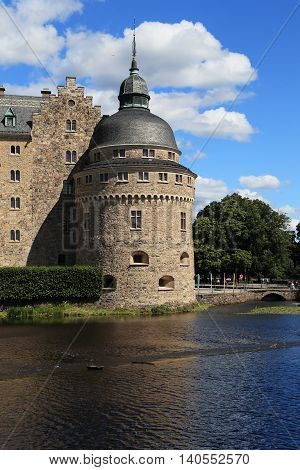 OREBRO, SWEDEN - JULY 7, 2016: This is one of the towers of the Castle Orebro one of the most famous and historically significant castles of the kingdom.