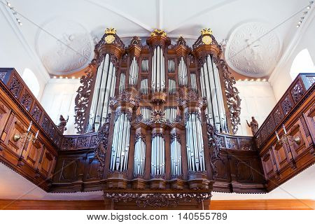 Copenhagen Denmark - July 22 2015: The ancient organ in the Holmens church inside