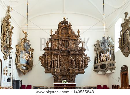 Copenhagen Denmark - July 22 2015: The wooden altarpiece in the Holmens church inside