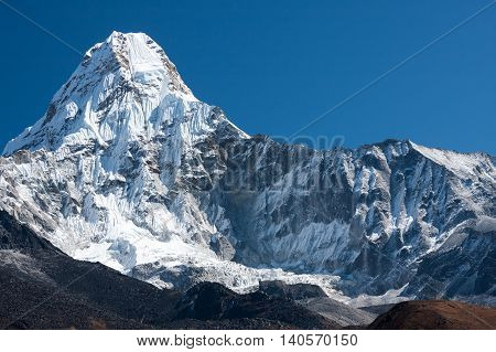 Summit of Ama Dablam from trekking route to Everest Pangboche Solukhumbu Nepal.
