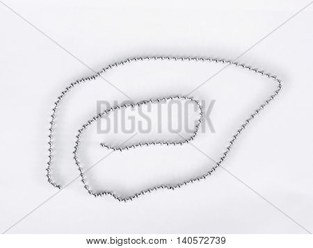 Silver jewelry chain, isolated on white background .