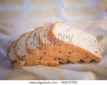 cereal bread in the morning . Placed on brown cloth.