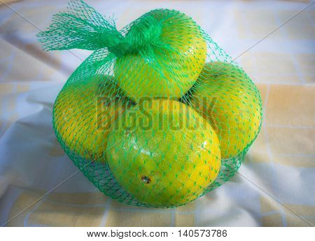 Oranges in the morning . Placed on brown cloth.