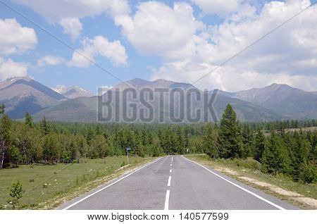 Tarmac road leading to the Sayan Mountains. Buryat Republic
