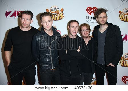 NEW YORK-DEC 12: (L-R) Zach Filkins, Ryan Tedder, Eddie Fisher, Drew Brown & Brent Kutzle of OneRepublic attend Z100's Jingle Ball 2014 at Madison Square Garden on December 12, 2014 in New York City.