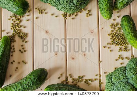 Healthy Organic Vegetables On A Wooden Background.