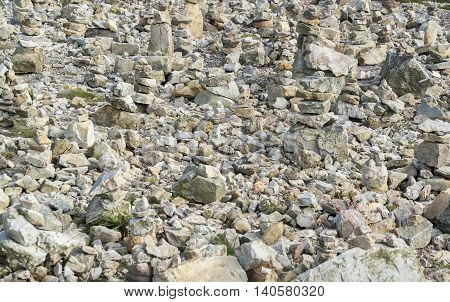 lots of small stacked stone piles at the Crozon peninsula around Pointe de Pen-Hirin Brittany France