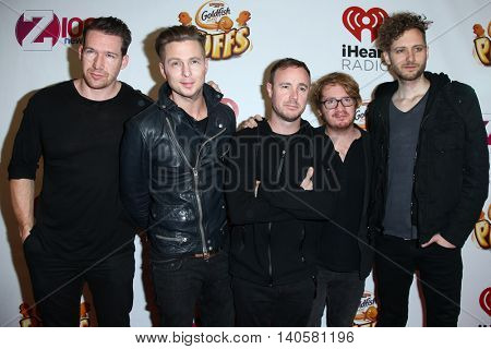 NEW YORK-DEC 12:(L-R) Zach Filkins, Ryan Tedder, Eddie Fisher, Drew Brown and Brent Kutzle of OneRepublic attend Z100's Jingle Ball 2014 at Madison Square Garden on December 12, 2014 in New York City.