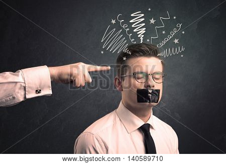 Caucasian business hand pointing at uncumprehended employee