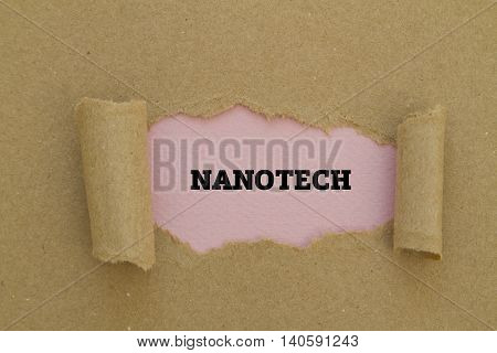Nanotech word written under torn paper .