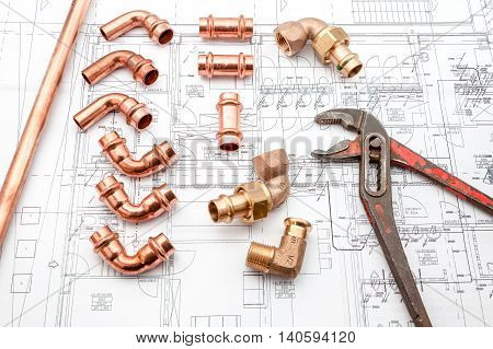 parts of copper with an o-ring seal on white background
