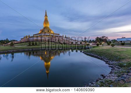 Maha Mongkol Bua Pagoda In Roi-ed Thailand At Sunset.