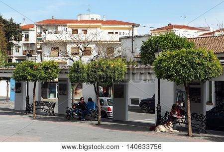 Orgiva, Andalucia, Spain - April 9, 2014 - A bus stop in the central square in the April 9, 2014 in Orgiva, Andalusia, Spain.